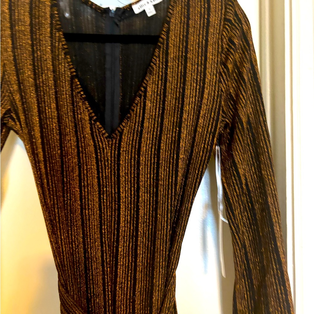 Elegant black and orange jumpsuit.